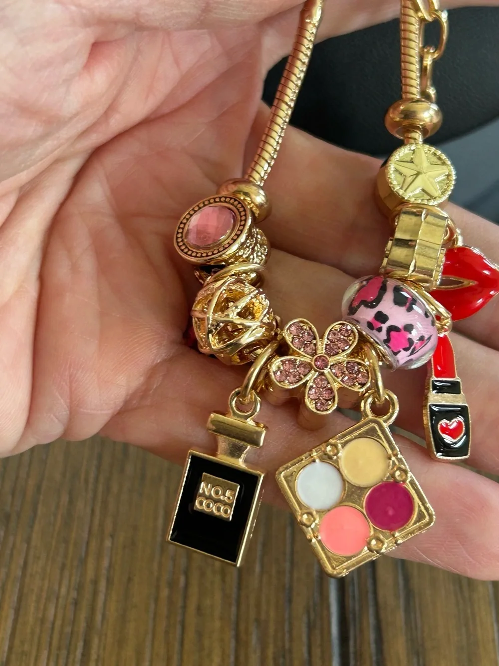 Brand New Gold Charm Bracelet with Pink and Red Enamel Makeup Charms